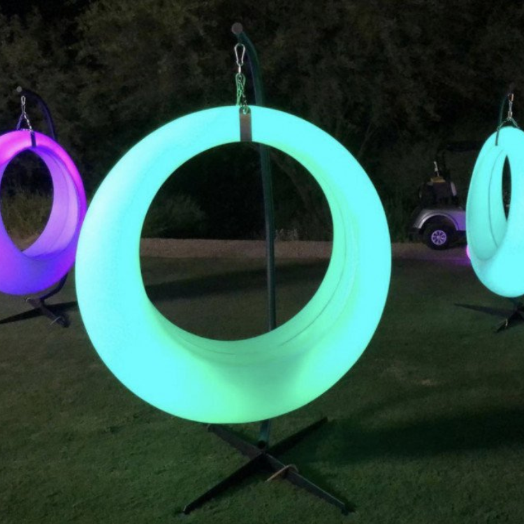 Singular LED circular swing with a stand
