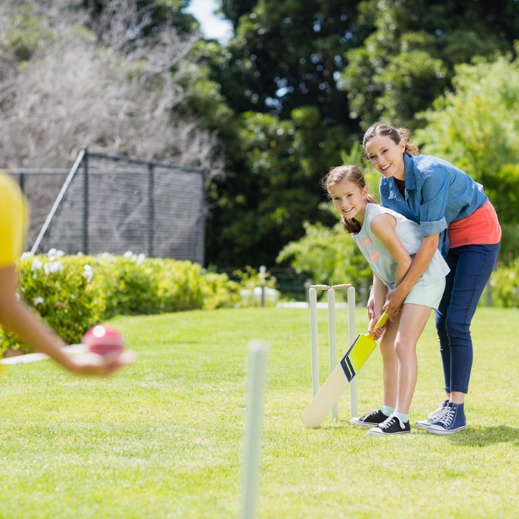 Playing backyard cricket game