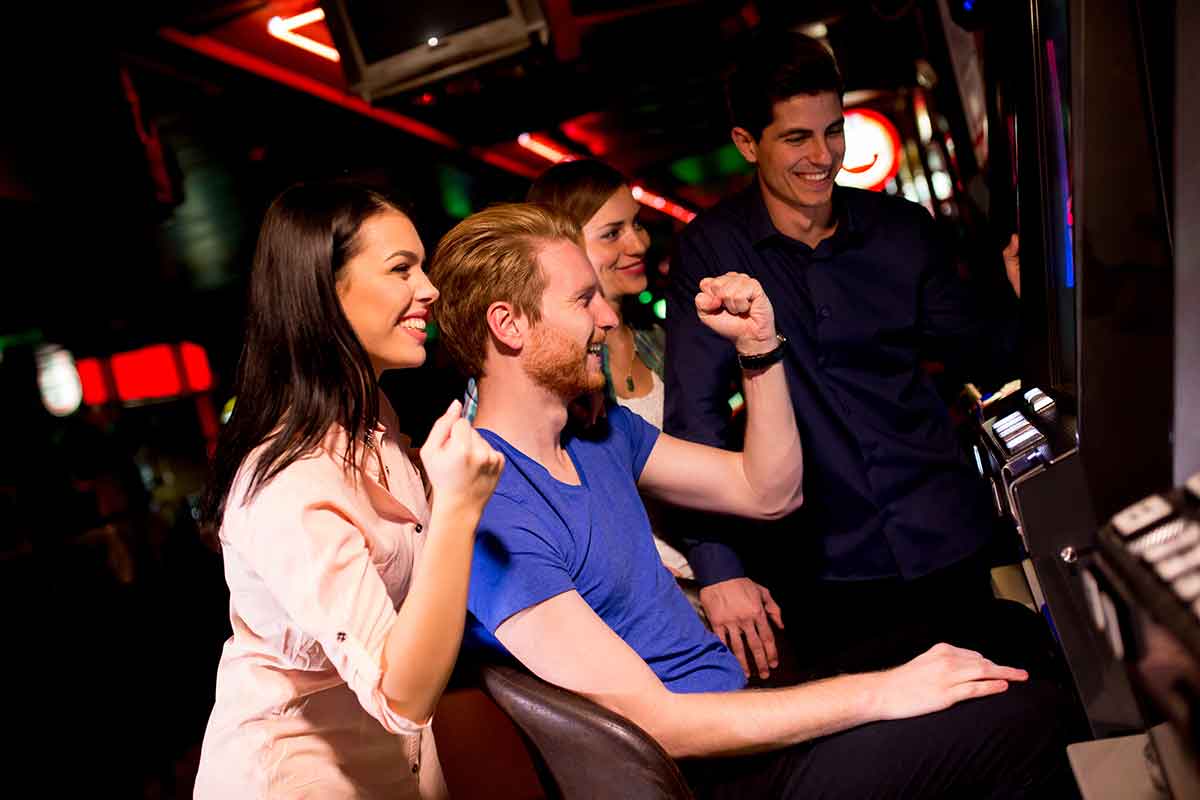 young-people-playing-arcade-game